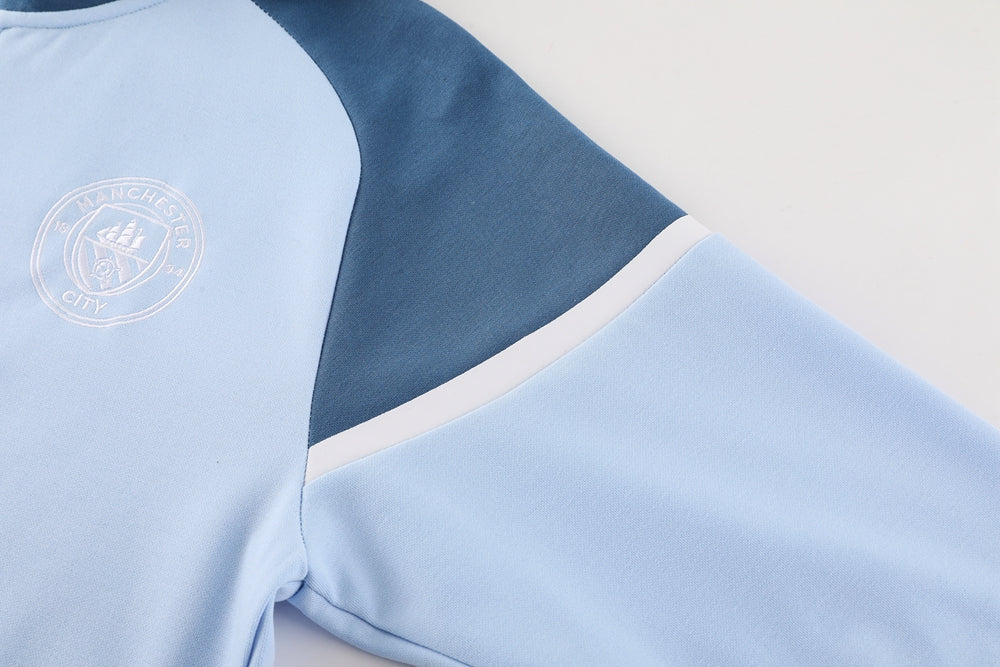 CONJUNTO TREINO COM CAPUZ MANCHESTER CITY JAQUETA+CALÇA - AZUL CLARO 2023/24