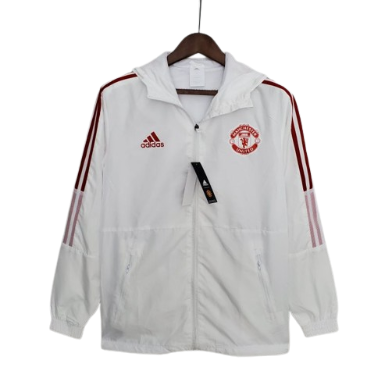 JAQUETA CORTA VENTO MANCHESTER UNITED BRANCO/VERMELHO - 2021/22