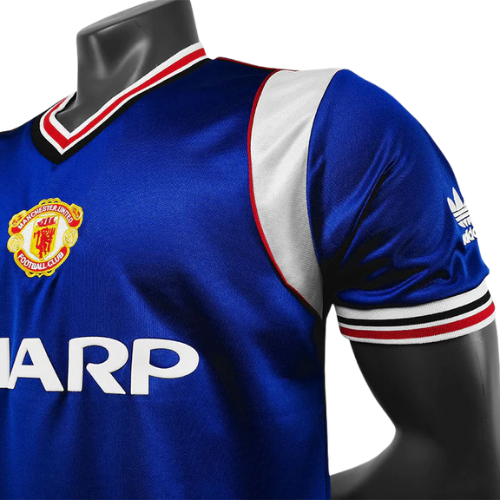CAMISA MANCHESTER UNITED RETRÔ AZUL - 1985/86