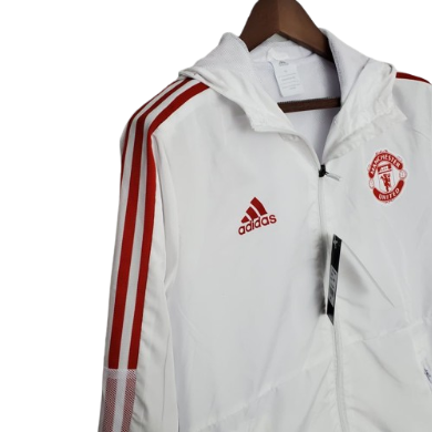 JAQUETA CORTA VENTO MANCHESTER UNITED BRANCO/VERMELHO - 2021/22